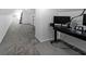Spacious attic with sloped ceilings, gray carpet and a dark desk at 167 Garden Ln, Decatur, GA 30030