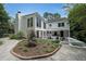 Backyard of home featuring an in-ground garden, brick patios, and white exterior at 167 Garden Ln, Decatur, GA 30030