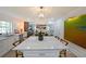 Bright kitchen features white cabinets, oversized island and shiplap walls at 167 Garden Ln, Decatur, GA 30030