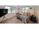 Stylish small living room with hardwood floors and a large window to bring in the natural light at 167 Garden Ln, Decatur, GA 30030