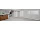 Finished basement with bar area, stairs, and great natural light at 1279 Colony Pl, Marietta, GA 30068