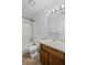 Bathroom featuring a shower and tub combo with a wooden vanity at 1279 Colony Pl, Marietta, GA 30068