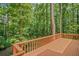 Outdoor deck overlooking lush greenery and mature trees at 1279 Colony Pl, Marietta, GA 30068