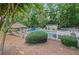 Community pool with a gazebo, pool house, lounge chairs, and blue umbrellas at 1279 Colony Pl, Marietta, GA 30068