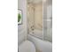 Clean and functional bathroom with a shower-tub combination and tiled walls at 2575 Peachtree Ne Rd # 15F, Atlanta, GA 30305