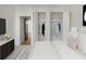 Well-lit bedroom with closet space and a view of the balcony at 2575 Peachtree Ne Rd # 15F, Atlanta, GA 30305