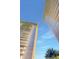 Striking view of modern high-rise condominiums against a clear blue sky at 2575 Peachtree Ne Rd # 15F, Atlanta, GA 30305