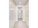Hallway view of the bathroom, showcasing closet space at 2575 Peachtree Ne Rd # 15F, Atlanta, GA 30305