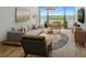 Bright living room featuring modern furnishings and sliding glass doors to balcony at 2575 Peachtree Ne Rd # 15F, Atlanta, GA 30305