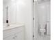 Bathroom with white vanity and a toilet room in the background at 3741 Cape York Trce, Alpharetta, GA 30022