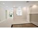 Hallway displaying neutral walls, recessed lights, carpet flooring, and an entrance into another room at 3741 Cape York Trce, Alpharetta, GA 30022