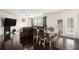 Spacious living room with wood floors, fireplace, and ample seating at 610 Brickstone Ct, Covington, GA 30016