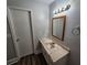 Bathroom featuring a stylish vanity with a unique countertop and modern lighting at 636 Raven Springs Trl, Stone Mountain, GA 30087