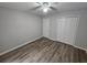 Bedroom with vinyl floors and double closets at 636 Raven Springs Trl, Stone Mountain, GA 30087