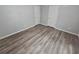 Bedroom with vinyl floors and double closets at 636 Raven Springs Trl, Stone Mountain, GA 30087