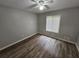 Bedroom with vinyl floors and ceiling fan at 636 Raven Springs Trl, Stone Mountain, GA 30087