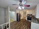 Well-equipped kitchen with stainless steel appliances, granite counters, and modern flooring at 636 Raven Springs Trl, Stone Mountain, GA 30087
