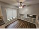 Bright breakfast nook with hardwood floors and ample sunlight, attached to kitchen at 636 Raven Springs Trl, Stone Mountain, GA 30087
