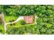 A bird's eye view of the home shows the deck area and circular drive at 1920 Daves Creek Trl, Cumming, GA 30041