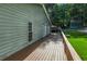 The back deck of this home provides an ample space for outdoor relaxation and entertaining with views of the spacious backyard at 1920 Daves Creek Trl, Cumming, GA 30041