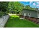 Well-maintained backyard with a spacious deck, perfect for outdoor gatherings and enjoying the natural surroundings at 1920 Daves Creek Trl, Cumming, GA 30041