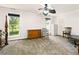 Spacious carpeted bedroom featuring neutral colors and natural lighting at 1920 Daves Creek Trl, Cumming, GA 30041