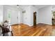 Spacious foyer featuring hardwood floors, decorative inlay, and traditional accents at 1920 Daves Creek Trl, Cumming, GA 30041