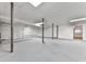 Unfinished basement with concrete flooring and exposed beams; a blank canvas ready for customization and ample storage at 2760 Hembree Ne Rd, Marietta, GA 30062