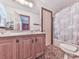 Functional bathroom with a swan-themed shower curtain and matching floor at 2760 Hembree Ne Rd, Marietta, GA 30062