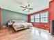 Comfortable bedroom with hardwood flooring and ample natural light from the double windows at 2760 Hembree Ne Rd, Marietta, GA 30062