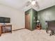 Neutral bedroom with a desk and television area, suitable for work or leisure at 2760 Hembree Ne Rd, Marietta, GA 30062