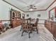 Traditional dining room with wooden table and chairs set, alongside a vintage hutch and decorative accents at 2760 Hembree Ne Rd, Marietta, GA 30062