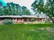 Inviting one story home featuring a covered porch, attached carport and large front yard at 2760 Hembree Ne Rd, Marietta, GA 30062