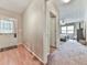 Hallway view leading to a bedroom; showcasing access to a private sleeping area, adding convenience to the layout at 2760 Hembree Ne Rd, Marietta, GA 30062
