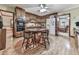 Charming kitchen with wood cabinets, breakfast table, and modern appliances, ideal for casual dining at 2760 Hembree Ne Rd, Marietta, GA 30062