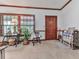 Inviting living room featuring a vintage sewing table, wood accents, and natural light at 2760 Hembree Ne Rd, Marietta, GA 30062