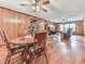 Open floor plan with hardwood floors connecting the dining area and living room, perfect for entertaining guests at 2760 Hembree Ne Rd, Marietta, GA 30062