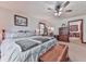 Inviting main bedroom featuring a comfortable bed, classic furnishings, and soft lighting, for ultimate relaxation at 2760 Hembree Ne Rd, Marietta, GA 30062