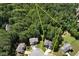Aerial view highlighting the property's boundaries and surrounding trees at 28 Mcevers Branch Ct, Acworth, GA 30101