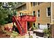 Multi-tiered deck and patio feature an outdoor hot tub and seating area at 28 Mcevers Branch Ct, Acworth, GA 30101