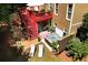 Aerial view of backyard with a hot tub, patio, deck, and outdoor seating, creating a perfect oasis at 28 Mcevers Branch Ct, Acworth, GA 30101