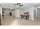 Spacious finished basement featuring multiple rooms, neutral decor, and modern ceiling fan at 28 Mcevers Branch Ct, Acworth, GA 30101
