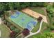 Aerial view of a community basketball court and playground, providing recreational opportunities for residents at 28 Mcevers Branch Ct, Acworth, GA 30101