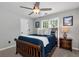 Comfortable bedroom featuring natural light, carpet, and a ceiling fan at 28 Mcevers Branch Ct, Acworth, GA 30101