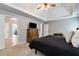 Spacious bedroom with tray ceiling, carpet, and neutral paint at 28 Mcevers Branch Ct, Acworth, GA 30101