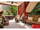 Inviting covered patio with comfortable seating and hot tub access, perfect for relaxation and outdoor enjoyment at 28 Mcevers Branch Ct, Acworth, GA 30101