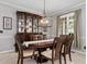 Dining room features traditional furnishings, neutral walls, and natural light at 28 Mcevers Branch Ct, Acworth, GA 30101