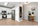 Modern kitchen with white cabinets, stainless steel appliances, and tile flooring at 28 Mcevers Branch Ct, Acworth, GA 30101