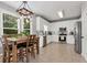 This bright kitchen features stainless steel appliances and an eat-in dining area at 28 Mcevers Branch Ct, Acworth, GA 30101