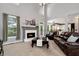 Spacious living room with fireplace features an open-concept floor plan at 28 Mcevers Branch Ct, Acworth, GA 30101